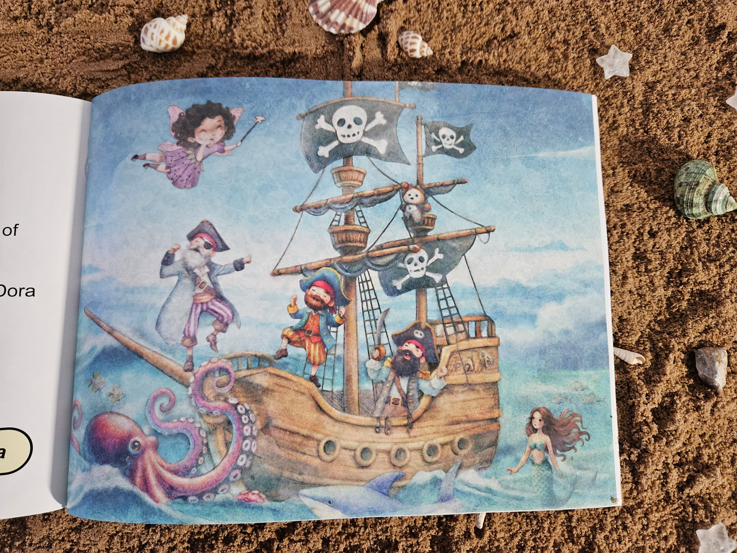 Picture of Dora Mary flying over the pirates of penzance and their ship. Octopus, dolphin and mermaid are in the sea around.