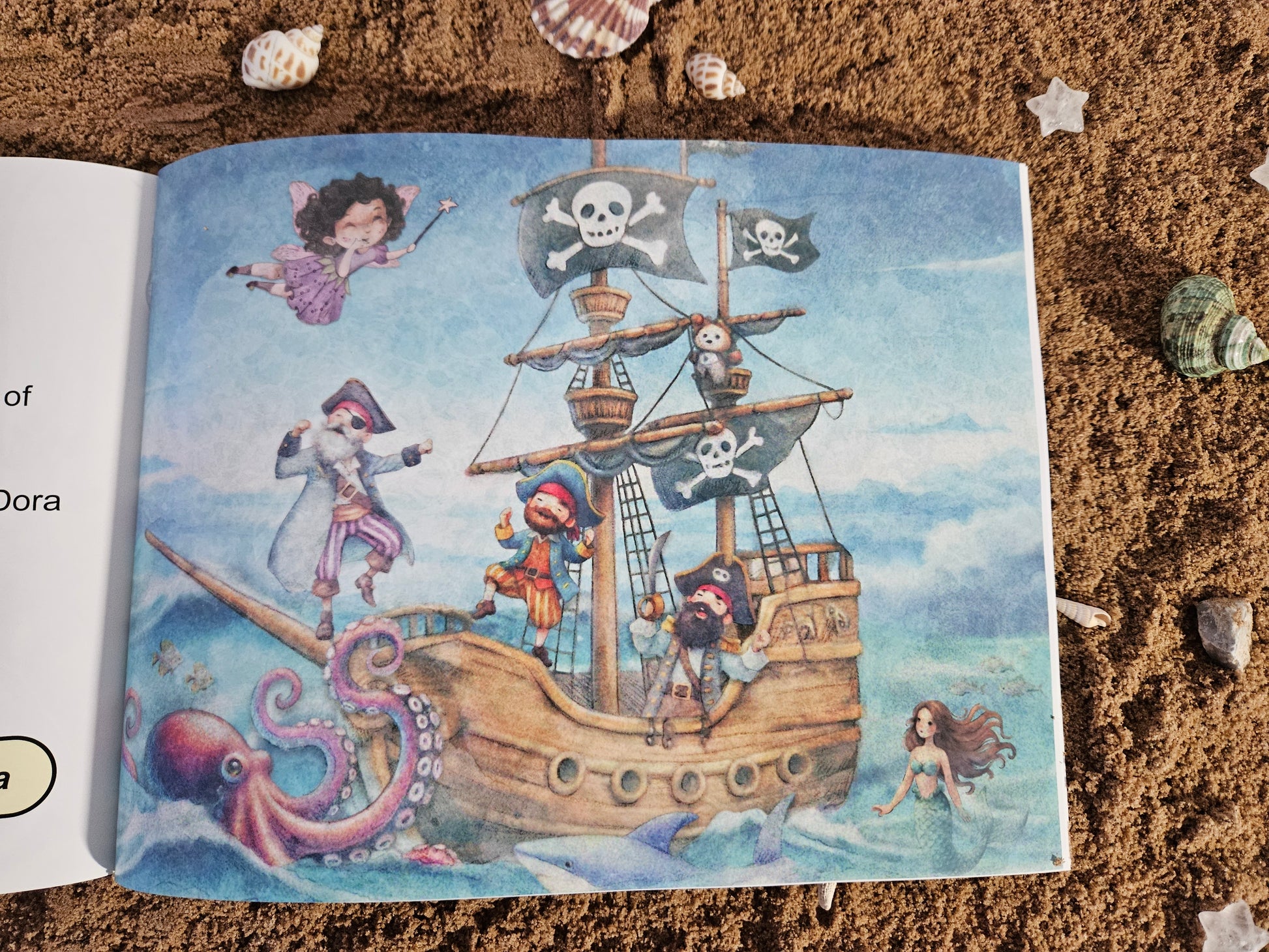 Picture of Dora Mary flying over the pirates of penzance and their ship. Octopus, dolphin and mermaid are in the sea around.